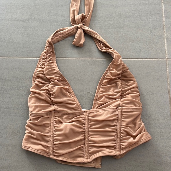 Halter runched crop top. NEVER WORN.Tag still on. Adjustable back and top sizing - Picture 1 of 4